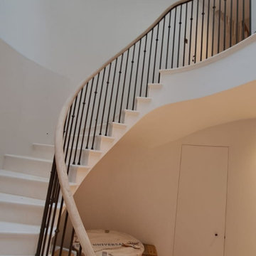 Oak handrail on a stone staircase