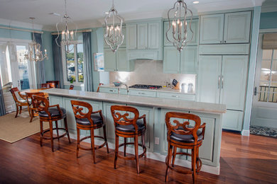 This is an example of a transitional kitchen in Miami.