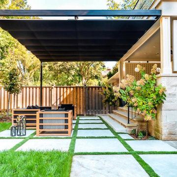Outdoor Firepit with Retractable Pergola & Flagstone