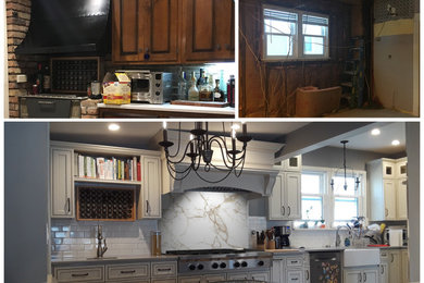 Inspiration for a mid-sized transitional galley porcelain tile and brown floor kitchen remodel in Chicago with a farmhouse sink, flat-panel cabinets, light wood cabinets, quartzite countertops, white backsplash, stone slab backsplash, stainless steel appliances and gray countertops
