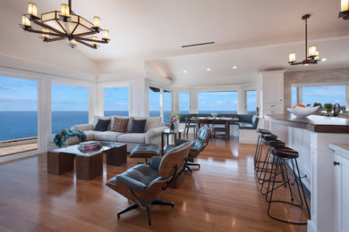 Family room - huge craftsman enclosed light wood floor and beige floor family room idea in Los Angeles with white walls, a standard fireplace, a brick fireplace and a wall-mounted tv