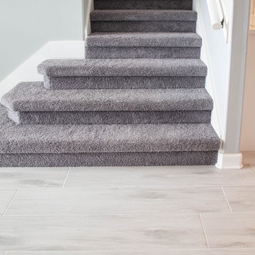 Carpeted Stairway Transition to Wood Look Tile