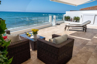 Trendy living room photo in Malaga