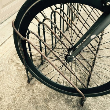 The playground bike rack might work for the playground, but it's hard on spokes.