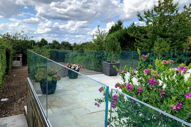 Inspiration for a contemporary house exterior in Surrey.
