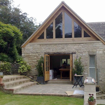 Glass wood balcony and extension, refurbishment of Cotswold stone house