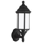 Sea Gull Lighting - Sea Gull Sevier 1 Up Light Outdoor Wall Lantern, Black/Satin - The Sea Gull Collection Sevier one light outdoor wall fixture in black creates a warm and inviting welcome presentation for your home's exterior. The Sevier outdoor collection by Sea Gull Collection brings timeless design to new heights with its traditional design details found in classic outdoor fixtures as well as an open bottom for easy maintenance. Made of durable cast aluminum, a multi-level crown, top finial and stepped-edge back plate complete the traditional look. Offered in Antique Bronze or Black finish, both with Clear glass, the collection includes a one-light outdoor pendant, one-light post lantern, a large one-light up light outdoor wall lantern, a small one-light up light outdoor wall lantern, a small one-light downlight outdoor wall lantern, and a large one-light downlight outdoor wall lantern.
