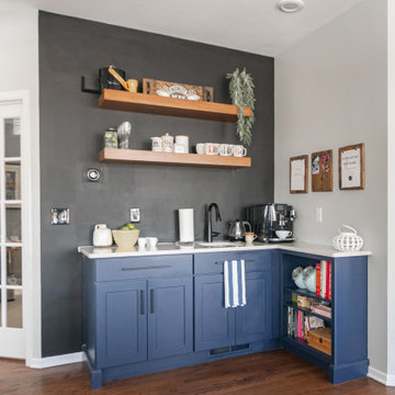 Bold Designer White & Blue Shaker Kitchen With Warm Accents