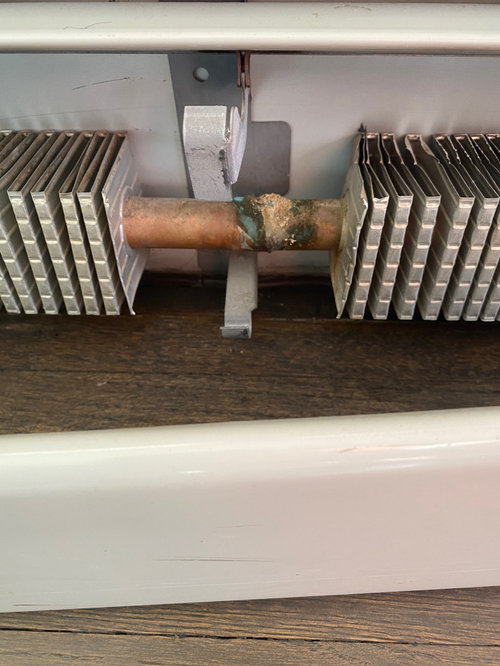 what causes hot water baseboard heat pipes to corrode?