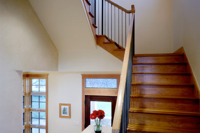 Example of an eclectic staircase design in Austin