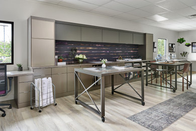 Example of a transitional home design design in Denver