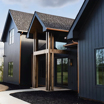 Black Modern Farmhouse Wood Beams and Copper Gutters