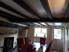 How To Lighten A Cottage With Small Windows And Black Wooden Beams