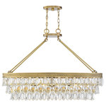 Savoy House - Windham 8-Light Linear Chandelier, Warm Brass - The Windham is a glamorous, modern chandelier that brings a touch of luxury and elegance to your home. The textured, elongated oval band of the frame, downrods, and disc-shaped canopy have a golden and bright, warm brass finish. This frame holds three descending tiers of gorgeous clear crystals. The alternating oval and teardrop shapes of the crystals add wonderful texture and sparkle. Eight 60W, C-style bulbs within, provide beautiful illumination overall a stunning choice for your glam, contemporary, or transitional decor style. The chandelier is 38" long, 16" wide, and 26" high: a linear shape that's perfect for gathering areas in your dining room, living room, great room, kitchen island, hallway, or family room.