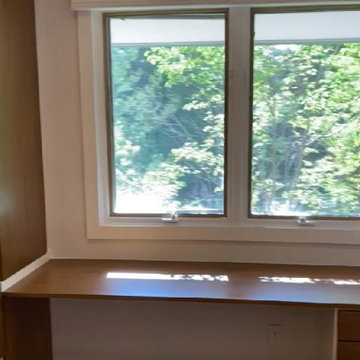Modern Master Closet with Lighting and Drawers
