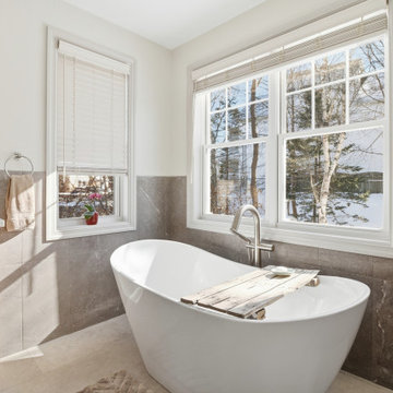 free standing tub with view | natural finishes