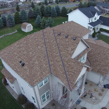 "Desert Tan" Owens Corning Duration Roof by Storm Group Roofing.