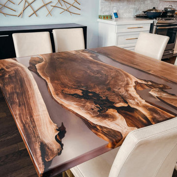 5'*5' Black walnut and clear resin Dining Table paired with gold legs.
