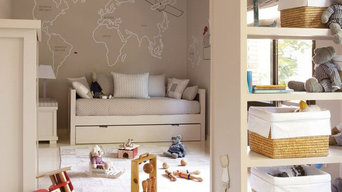 Habitacion infantil con mural mapamundi
