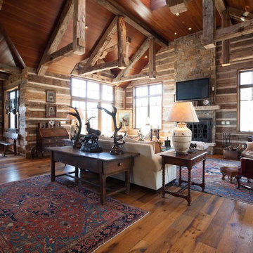Hand Hewn Hammer Beams and Slab Siding with Oak Flooring