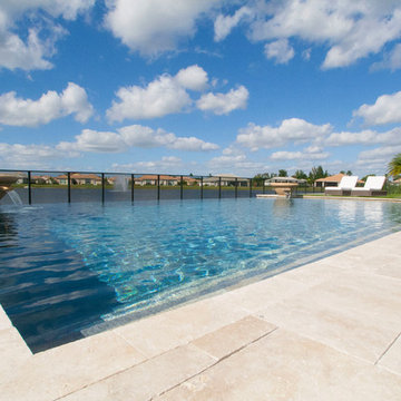 Big Pool with Infinity Edge and Custom Water Bowls in Davie, Florida