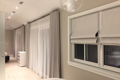 Inspiration for a mid-sized modern bedroom remodel in Toronto