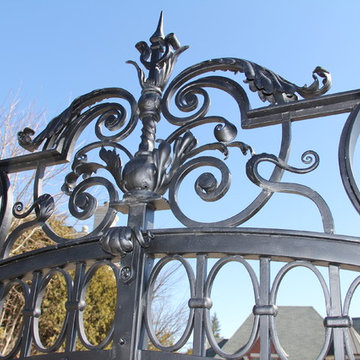 Gate and fence forged for Toronto private residence.