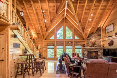 Example of a mountain style living room design in Other