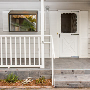 Pinwheel Porch with Shluter metal tile edges