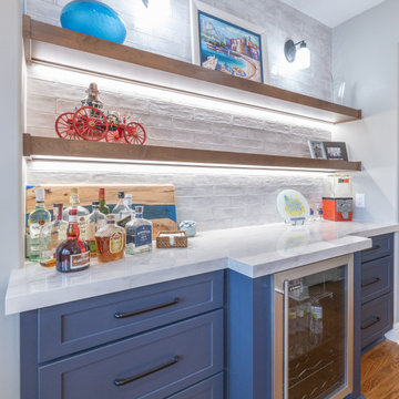 Porcelain Island Kitchen Remodel with Custom Built-Ins + Fireplace Feature