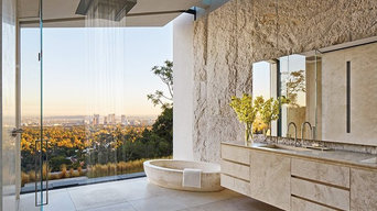 Travertine bathroom in Michael Bay home in Los Angeles