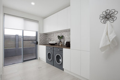 This is an example of a laundry room in Newcastle - Maitland.