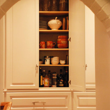Lintel between garage and pantry was curved to provide headroom for steps up int