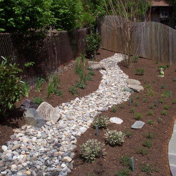 Silver Spring foundation planting and dry creek bed