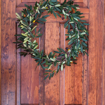 Nearly Natural Olive Wreath - Dark Brown Stained Door at Entryway