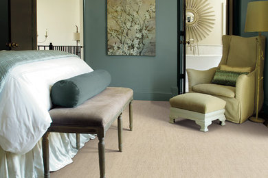 Inspiration for a mid-sized timeless master carpeted and beige floor bedroom remodel in Boston with green walls and no fireplace