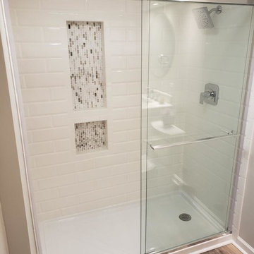Two Bathroom Renovations and Custom Closet Shelving with Custom Tile Showers