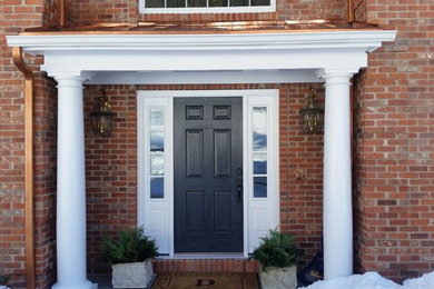 Mid-sized minimalist entryway photo in New York