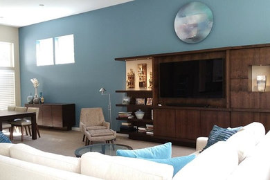 Living room - mid-sized modern formal and open concept carpeted living room idea in Chicago with green walls and a media wall