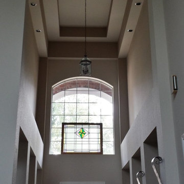 Amazing Entrance in Accessible Beige SW7036 and Tony Taupe SW7038