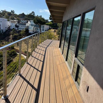 77 foot cantilevered balcony with *Trex Deck and cable railing.