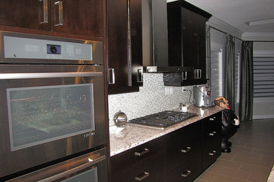 Example of a trendy kitchen design in Calgary
