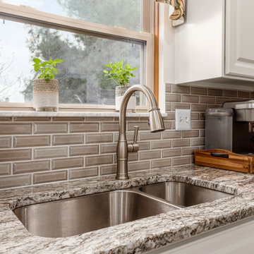 Transitional Kitchen Remodel Done in a White Satin Breckenridge Door