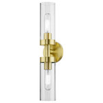 Livex Lighting - Ludlow 2 Light Satin Brass ADA Vanity Sconce - Add a dash of character and radiance to your home with this wall sconce. This two-light fixture from the Ludlow Collection features a satin brass finish with a clear glass. The clean lines of the back plate complement the cylindrical glass shades creating a minimal, sleek, urban look that works well in most decors. This fixture adds upscale charm and contemporary aesthetics to your home.