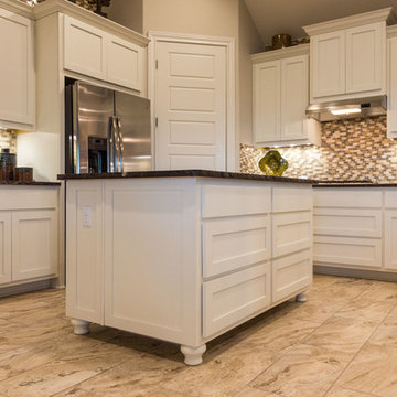 Shaker kitchen with furniture style island with bunn feet