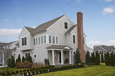 Mid-sized coastal gray two-story wood exterior home idea in New York