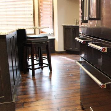 DuraSupreme Peppercorn Kitchen With Cambria Tops and Black Stainless Appliances