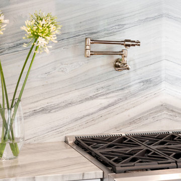 Foxtop Transitional Kitchen with Striking Quartzite Countertops