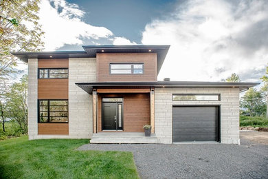 Inspiration for a contemporary exterior home remodel in Montreal
