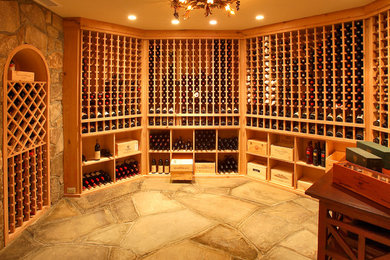 Design ideas for a traditional wine cellar in New York with storage racks.